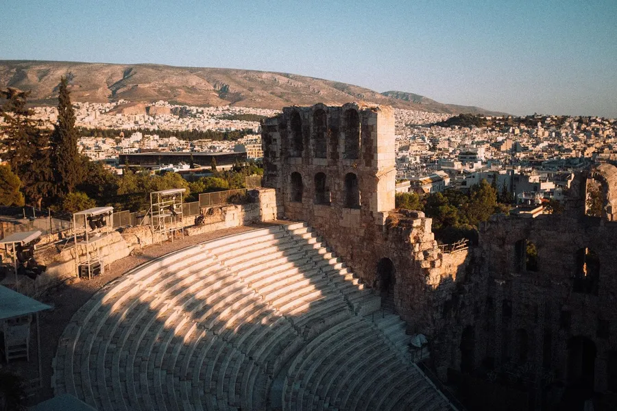 Odeon of Herodes Atticus in evening light overlooking the city, Athens, flash by Kilian Amrehn
