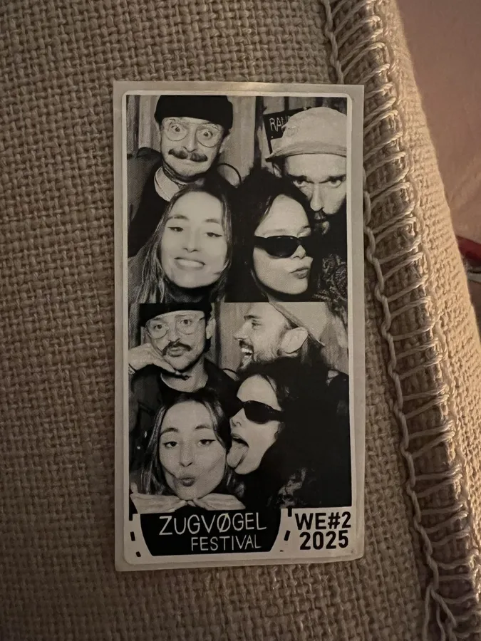 Black and white photo booth strips from Zugvögel Festival 2025 on burlap, flash by Kilian Amrehn