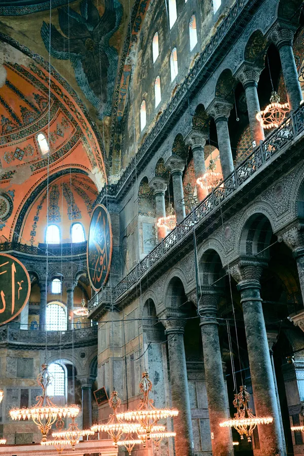 Galleries, columns and dome mosaics inside Hagia Sophia, Istanbul, flash by Kilian Amrehn
